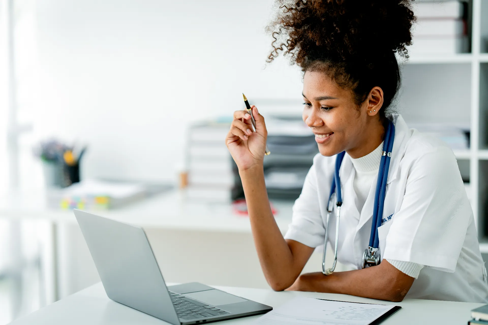 Medical student completing a residency application on a laptop before the ERAS deadline Medical student completing a residency application on a laptop before the ERAS deadline