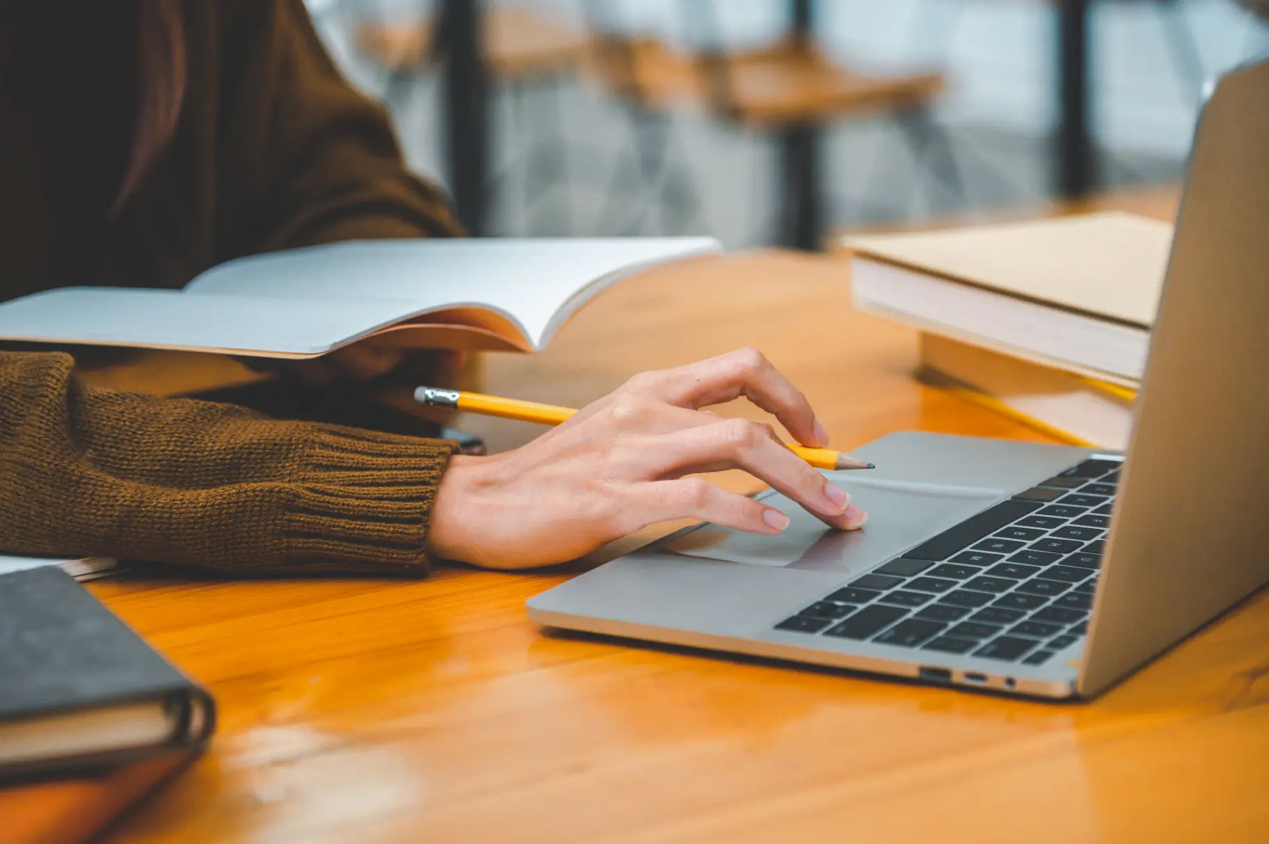 Medical student preparing for USMLE Step 1 using practice questions on a laptop Medical student preparing for USMLE Step 1 using practice questions on a laptop