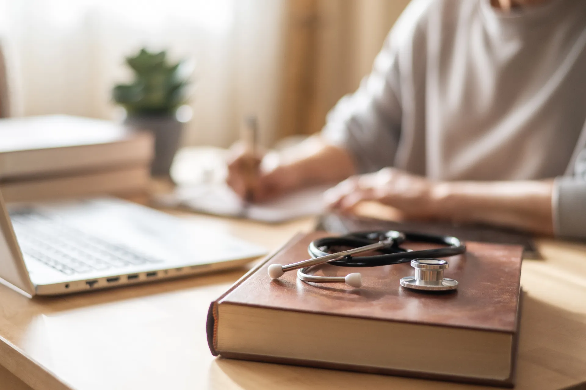 Medical student taking a practice exam while preparing for USMLE Step 1 Medical student taking a practice exam while preparing for USMLE Step 1